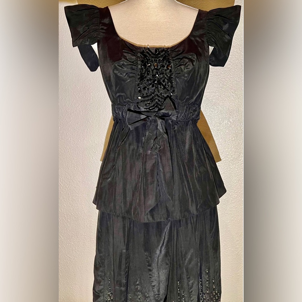 Black two-piece Magaschoni cocktail outfit, black skirt  with beaded black top
